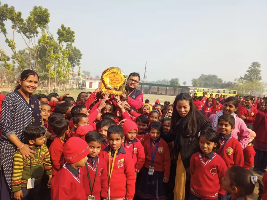Students with a trophy