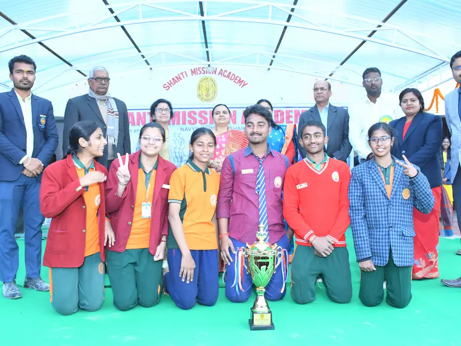 A winning team with the trophy