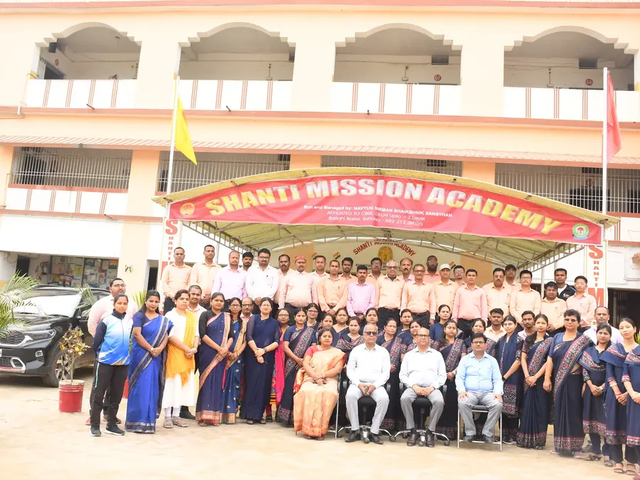 The whole school assembled in front of the block