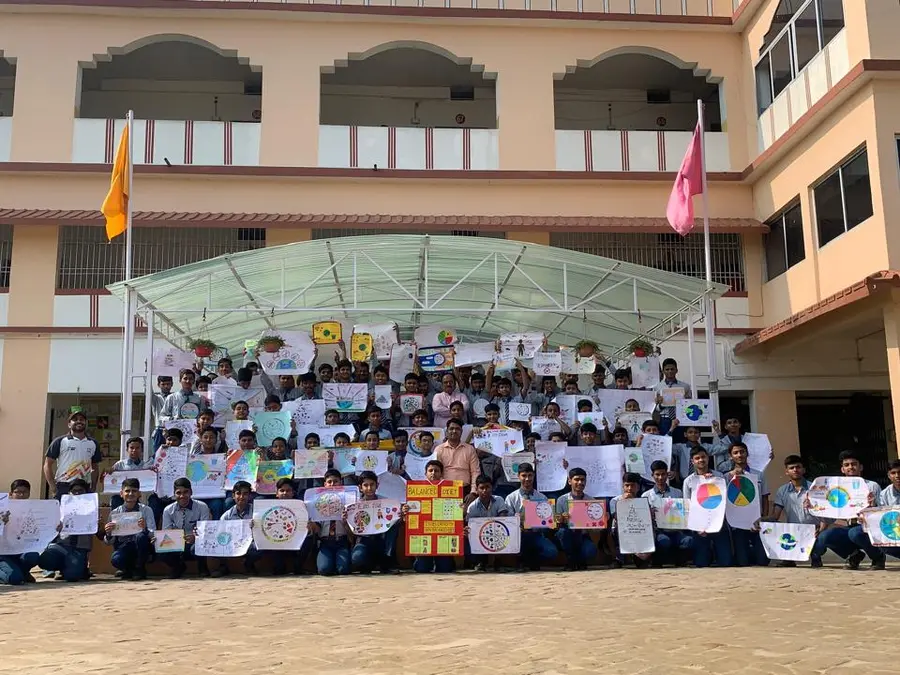 Students with awareness posters